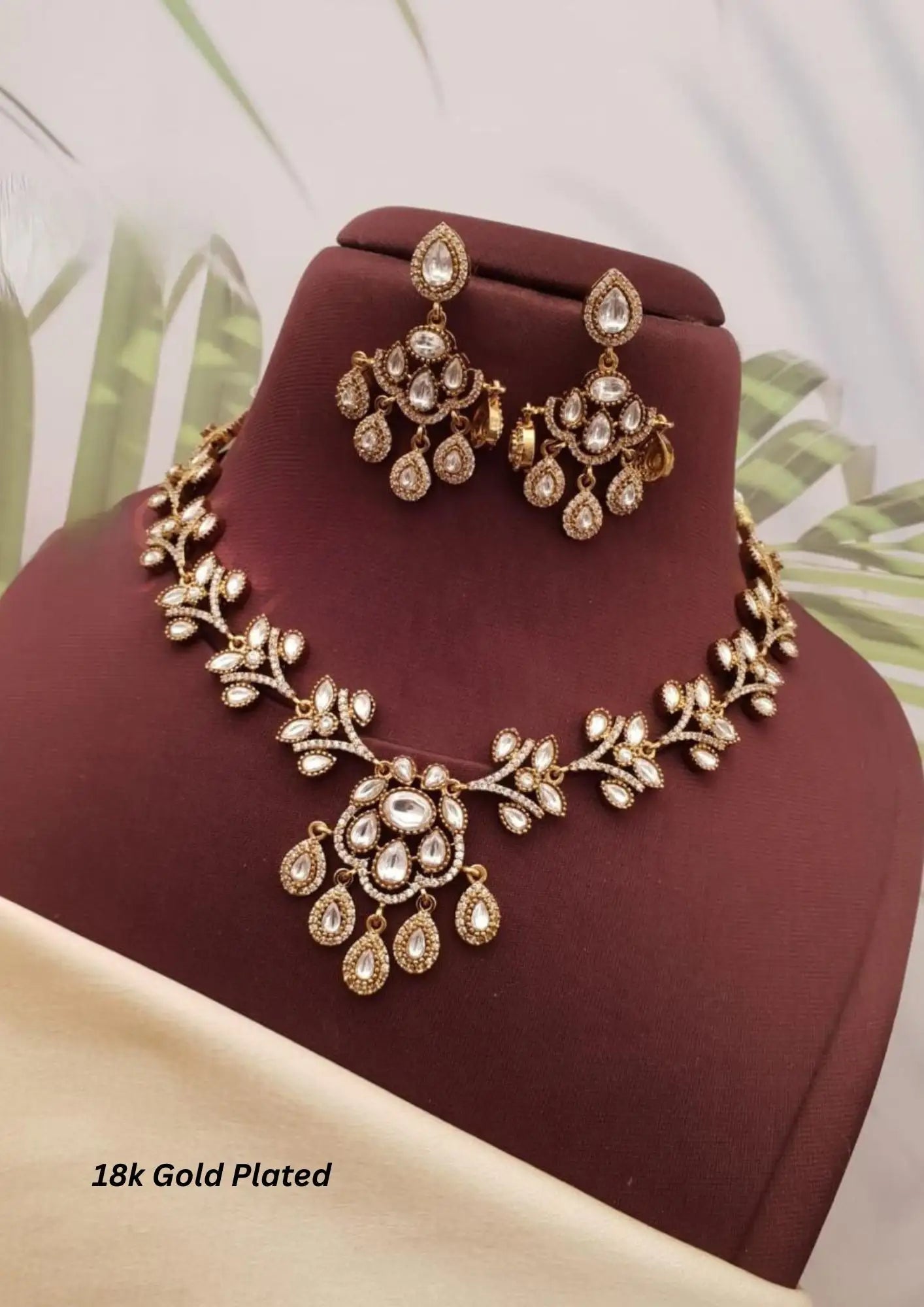 Kundan stone gold plated necklace with earrings